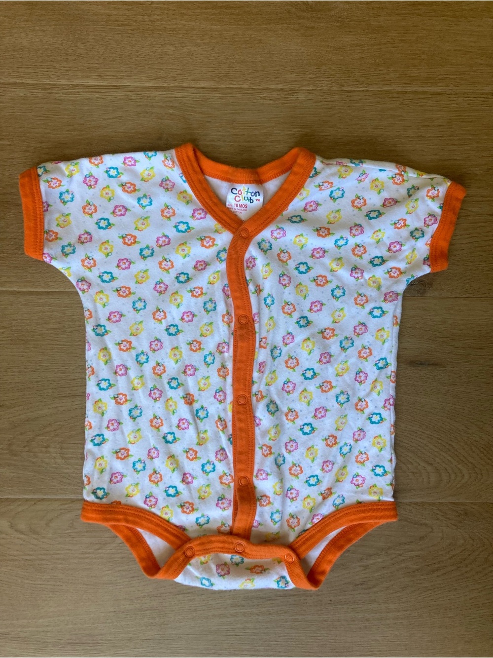 Vintage Cotton Club White Floral Baby Onesie with Orange Trim
